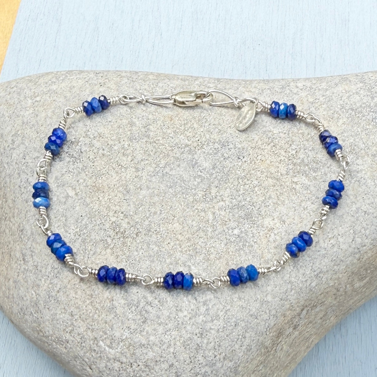 landing on blue bracelet