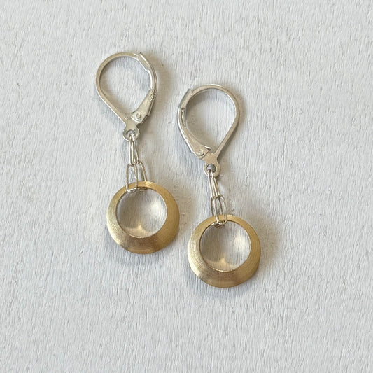 who has the scoop earrings