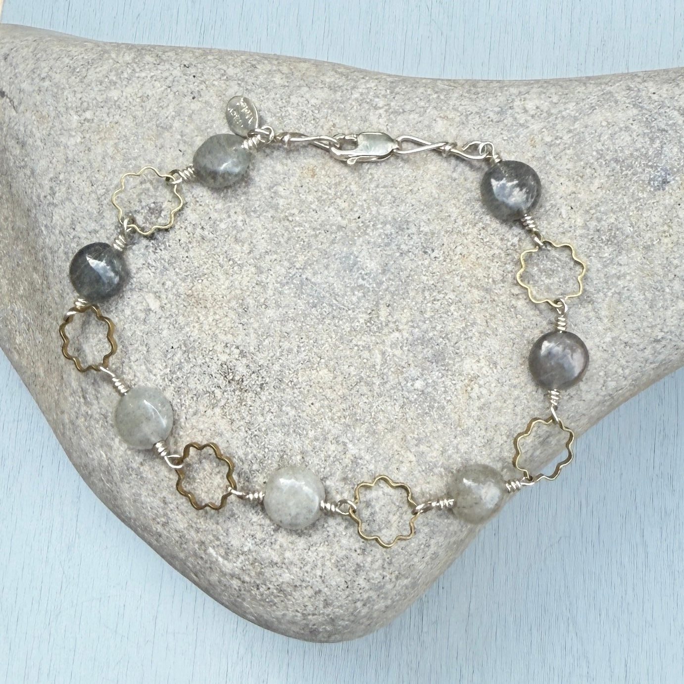 anna keeps collecting flowers bracelet