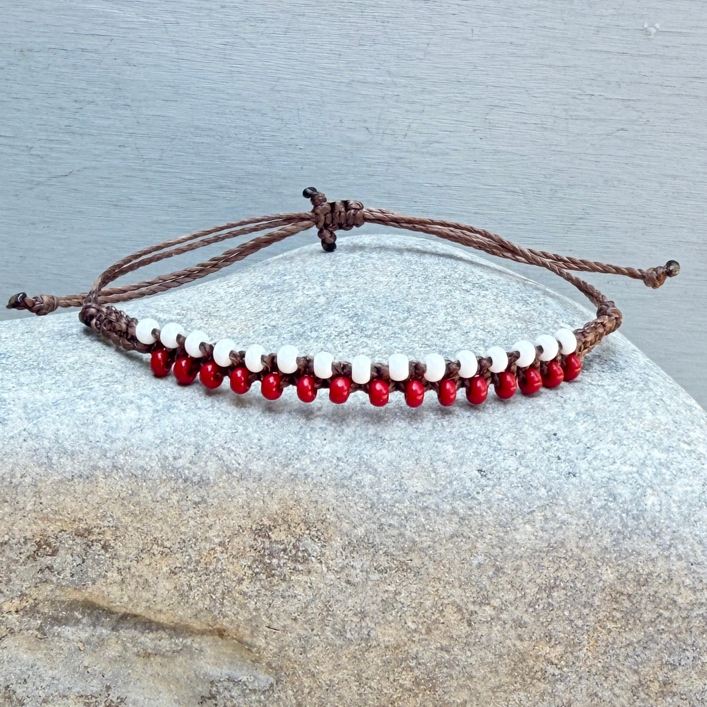 red and white fan wear bracelet