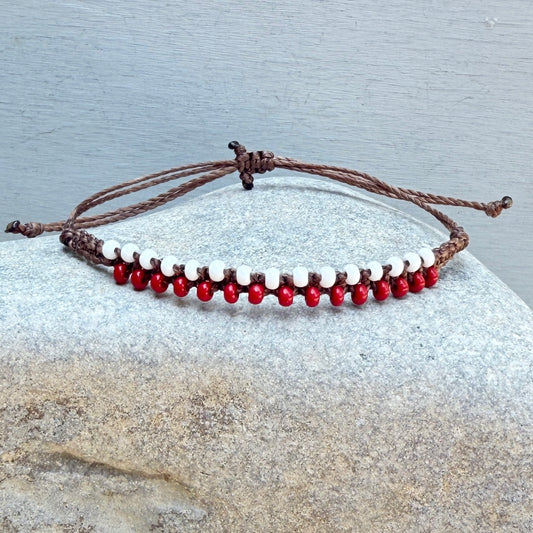 red and white fan wear bracelet