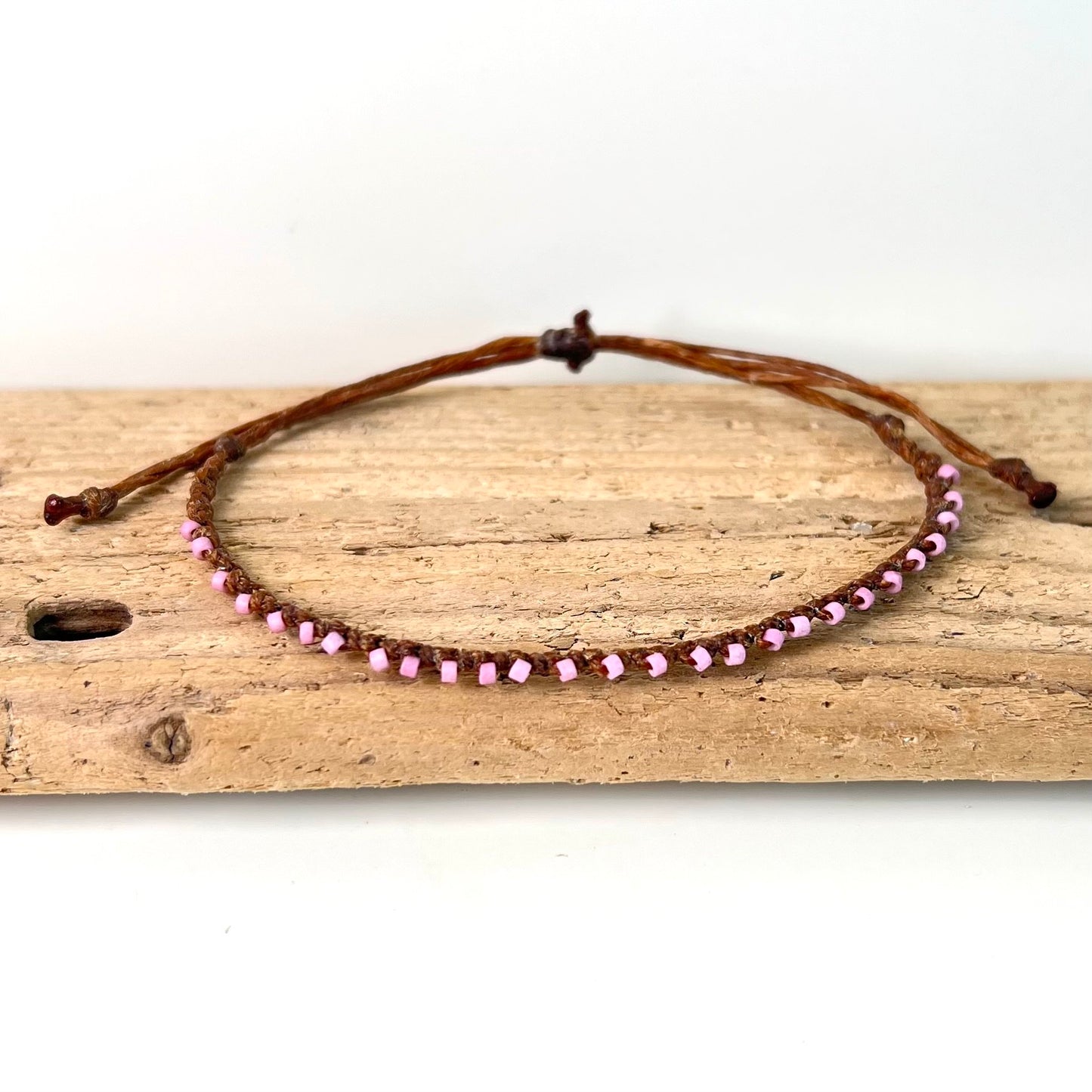 little itty bitty pink bracelet