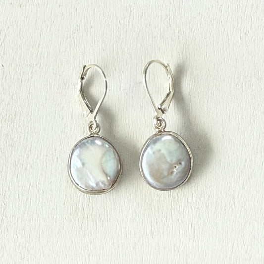 snuggled in pearl earrings